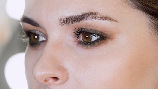 Close-up of an at-home lash lift treatment on a natural eye