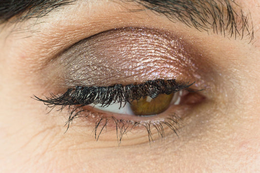 Macro close-up of natural eyelashes showing condition and texture